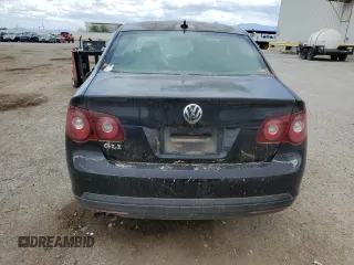 2009 Volkswagen Jetta GLI z VIN 3VWDJ71K79M042969, wystawiony jako Copart lot #50803665 z przebiegiem 191 689 mil mil oraz Szkoda całkowita • Salvage title. Historia ofert i sprzedaży dostępna na DreamBid. Obrazek 6.