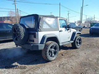 2013 Jeep Wrangler Sport with VIN 1C4AJWAG1DL595509, listed as a IAAI auction lot 41814406 with 59,263 mi miles and . Bid and sale history available at DreamBid. Image 4.