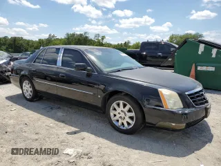 2010 Cadillac DTS 1SD z VIN 1G6KH5EY5AU110844, wystawiony jako Copart lot #57141785 z przebiegiem 173 657 mil mil oraz Tytuł czysty. Historia ofert i sprzedaży dostępna na DreamBid. Obrazek 4.