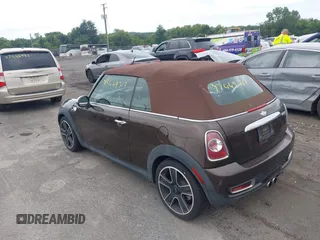 2011 MINI Convertible S with VIN WMWZP3C50BTX84044, listed as a IAAI auction lot 42669717 with Not provided miles and . Bid and sale history available at DreamBid. Image 3.