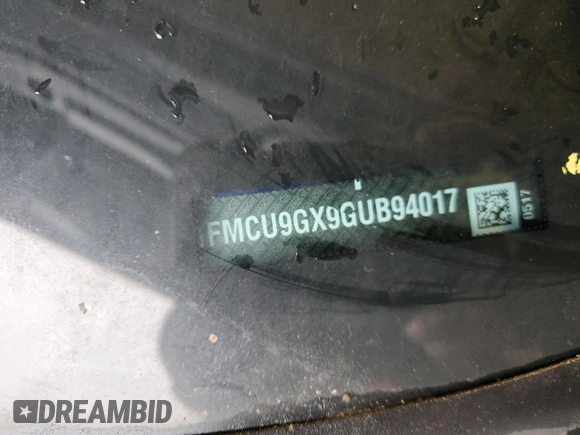 2016 Ford Escape SE z VIN 1FMCU9GX9GUB94017, wystawiony jako Copart lot #58201725 z przebiegiem 130 750 mil mil oraz Szkoda całkowita • Salvage title. Historia ofert i sprzedaży dostępna na DreamBid. Obrazek 14.