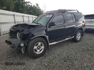 2002 Nissan Xterra XE with VIN 5N1ED28T42C518145, listed as a Copart auction lot 61599615 with 310,035 mi miles and Salvage title. Bid and sale history available at DreamBid. Image 1.