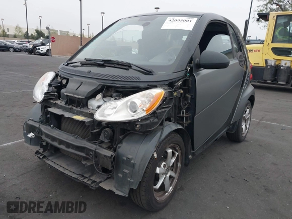 2015 Smart fortwo Passion with VIN WMEEJ3BA1FK787744, listed as a IAAI auction lot 42095001 with 43,370 mi miles and . Bid and sale history available at DreamBid. Image 2.