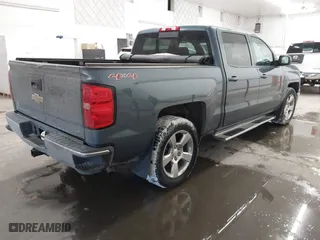 2014 Chevrolet Silverado 1500 LT with VIN 3GCUKREC4EG248967, listed as a IAAI auction lot 41553634 with 113,247 mi miles. Bid and sale history available at carsss.com. Image 4.