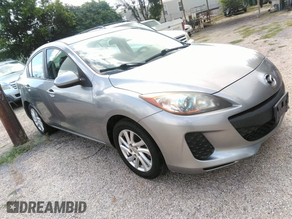 2012 Mazda 3 i Touring z VIN JM1BL1V83C1622692, wystawiony jako IAAI lot #42447571 z przebiegiem 136 065 mil mil oraz . Historia ofert i sprzedaży dostępna na DreamBid. Obrazek 1.