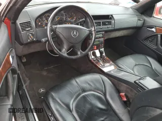 1999 Mercedes-Benz SL-Class with VIN WDBFA68F7XF175287, listed as a Copart auction lot 48520465 with 76,565 mi miles and Salvage Title. Bid and sale history available at carsss.com. Image 8.