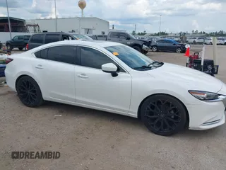 2018 Mazda 6 Grand Touring Reserve with VIN JM1GL1WY1J1321517, listed as a IAAI auction lot 39411226 with 50,280 mi miles and . Bid and sale history available at DreamBid. Image 13.