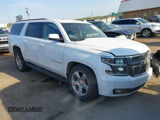 2020 Chevrolet Suburban LT z VIN 1GNSKHKC7LR125223, wystawiony jako IAAI lot #41981642 z przebiegiem 115 856 mil mil oraz . Historia ofert i sprzedaży dostępna na DreamBid. Obrazek 1.