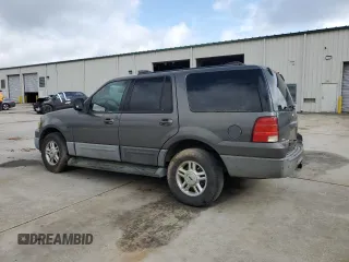 2004 Ford Expedition Special Service with VIN 1FMFU16L54LA95354, listed as a Copart auction lot 57027115 with 176,243 mi miles and Salvage title. Bid and sale history available at DreamBid. Image 2.