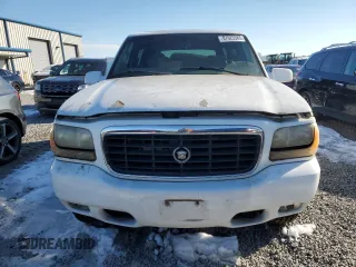 1999 Cadillac Escalade z VIN 1GYEK13R3XR406970, wystawiony jako Copart lot #87623365 z przebiegiem 189 339 mil mil oraz Szkoda całkowita • Salvage title. Historia ofert i sprzedaży dostępna na DreamBid. Obrazek 5.