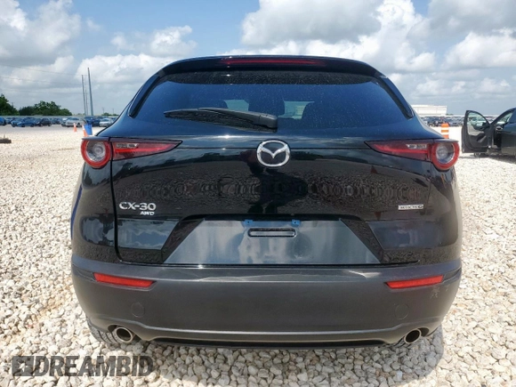 2021 Mazda CX-30 Select z VIN 3MVDMBBL1MM316081, wystawiony jako Copart lot #59577265 z przebiegiem 26 841 mil mil oraz Szkoda całkowita • Salvage title. Historia ofert i sprzedaży dostępna na DreamBid. Obrazek 6.