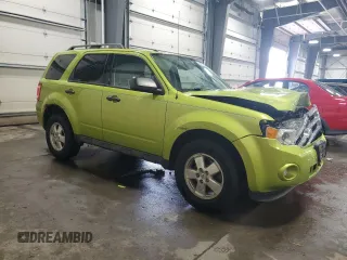 2012 Ford Escape XLT with VIN 1FMCU9D7XCKA07488, listed as a Copart auction lot 58605185 with 144,578 mi miles and Salvage title. Bid and sale history available at DreamBid. Image 4.