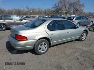 2000 Dodge Stratus z VIN 1B3EJ56H5YN250525, wystawiony jako IAAI lot #42002577 z przebiegiem 101 575 mil mil oraz . Historia ofert i sprzedaży dostępna na DreamBid. Obrazek 4.