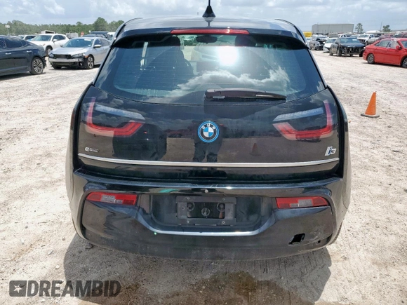 2018 BMW i3 with VIN WBY7Z4C57JVD95738, listed as a Copart auction lot 61080315 with Not provided miles and Salvage title. Bid and sale history available at DreamBid. Image 6.