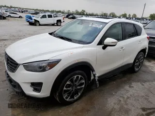 2016 Mazda CX-5 Grand Touring z VIN JM3KE4DY4G0637766, wystawiony jako Copart lot #53743295 z przebiegiem Nie podano mil oraz Szkoda całkowita • Salvage title. Historia ofert i sprzedaży dostępna na DreamBid. Obrazek 1.
