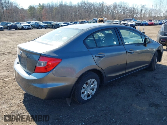 2012 Honda Civic LX z VIN 19XFB2F52CE329264, wystawiony jako IAAI lot #41654894 z przebiegiem 110 836 mil mil oraz . Historia ofert i sprzedaży dostępna na DreamBid. Obrazek 4.