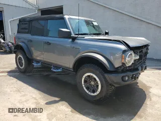 2023 Ford Bronco с VIN 1FMEE5DH2PLB21489, выставлен на аукционе Copart как лот 60690365 с пробегом 14 326 миль миль и Списание • Salvage title. История ставок и продаж доступна на DreamBid. Изображение 4.