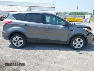 2014 Ford Escape SE with VIN 1FMCU9GXXEUE08655, listed as a IAAI auction lot 42469634 with 163,054 mi miles and . Bid and sale history available at DreamBid. Image 13.