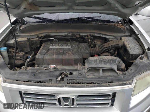 2006 Honda Ridgeline RTL z VIN 2HJYK16546H544183, wystawiony jako Copart lot #57426655 z przebiegiem 162 878 mil mil oraz Szkoda całkowita • Salvage title. Historia ofert i sprzedaży dostępna na DreamBid. Obrazek 11.