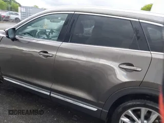 2016 Mazda CX-9 Grand Touring z VIN JM3TCADY6G0126391, wystawiony jako IAAI lot #42242541 z przebiegiem 45 147 mil mil oraz . Historia ofert i sprzedaży dostępna na DreamBid. Obrazek 14.