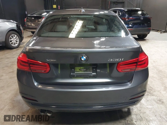 2018 BMW 3 Series 330i xDrive with VIN WBA8D9C51JEM34061, listed as a IAAI auction lot 42682318 with 65,245 mi miles and . Bid and sale history available at DreamBid. Image 16.