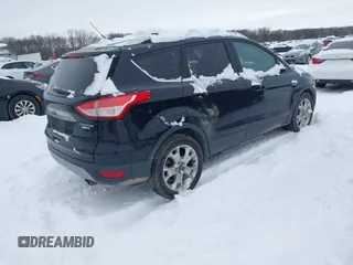 2016 Ford Escape Titanium with VIN 1FMCU9J96GUC08563, listed as a IAAI auction lot 41252475 with 120,404 mi miles. Bid and sale history available at carsss.com. Image 4.