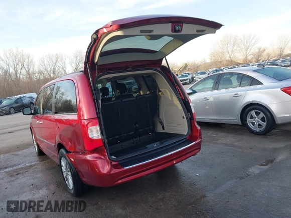 2015 Chrysler Town & Country Touring-L with VIN 2C4RC1CG7FR674321, listed as a IAAI auction lot 41750796 with 165,179 mi miles. Bid and sale history available at carsss.com. Image 3.