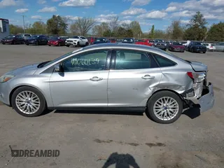 2012 Ford Focus SEL with VIN 1FAHP3H29CL151658, listed as a IAAI auction lot 42060139 with 149,547 mi miles and . Bid and sale history available at carsss.com. Image 14.
