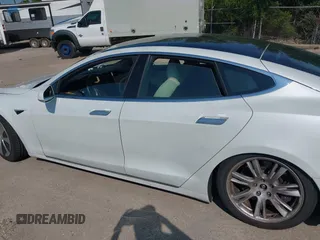 2020 Tesla Model S Long Range with VIN 5YJSA1E29LF389023, listed as a IAAI auction lot 42509364 with 93,070 mi miles and . Bid and sale history available at DreamBid. Image 13.