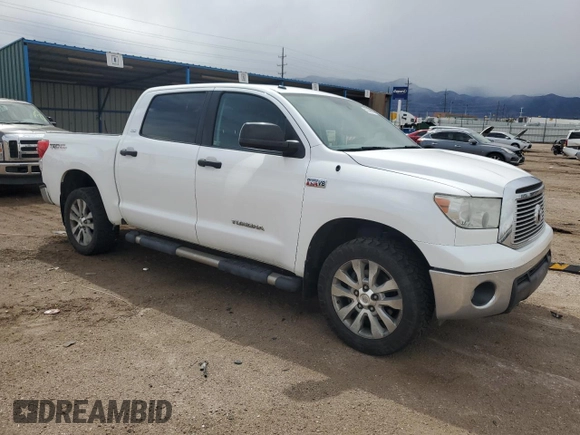 2012 Toyota Tundra 4WD Truck with VIN 5TFDY5F17CX252265, listed as a Copart auction lot 51209395 with 111,183 mi miles and Salvage Title. Bid and sale history available at carsss.com. Image 4.
