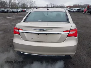 2014 Chrysler 200 LX with VIN 1C3CCBAB2EN213983, listed as a IAAI auction lot 42006774 with 80,615 mi miles and . Bid and sale history available at carsss.com. Image 16.