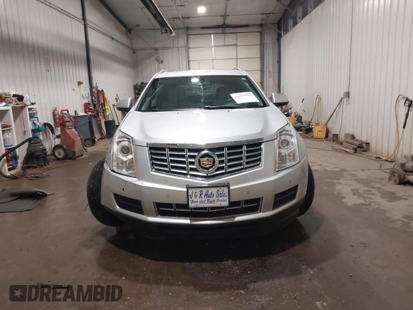 2016 Cadillac SRX Luxury Collection with VIN 3GYFNEE3XGS566210, listed as a IAAI auction lot 42094984 with 99,671 mi miles and . Bid and sale history available at DreamBid. Image 12.