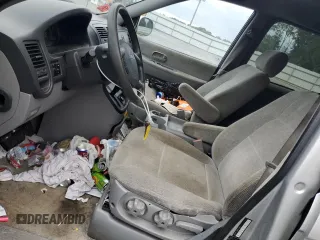 2005 Kia Sedona LX with VIN KNDUP132856712907, listed as a Copart auction lot 75751424 with 177,893 mi miles and Salvage Title. Bid and sale history available at carsss.com. Image 7.