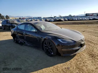 2023 Tesla Model S with VIN 5YJSA1E52PF499802, listed as a Copart auction lot 88585675 with 0 mi miles and Salvage Title. Bid and sale history available at carsss.com. Image 4.