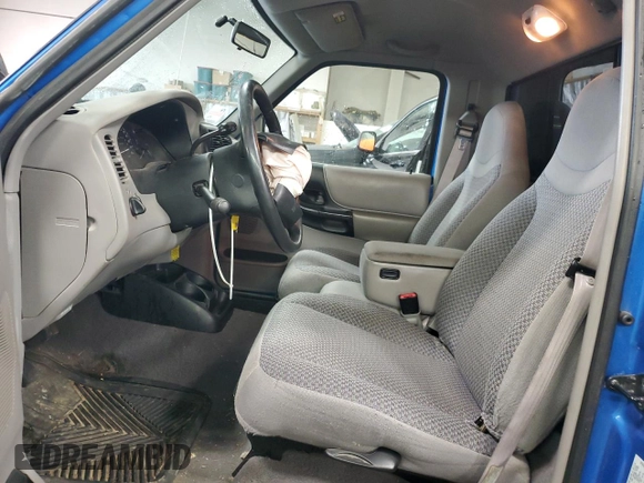 1999 Ford Ranger XLT with VIN 1FTYR10X0XUA52307, listed as a Copart auction lot 50044505 with 94,457 mi miles and Salvage title. Bid and sale history available at DreamBid. Image 7.