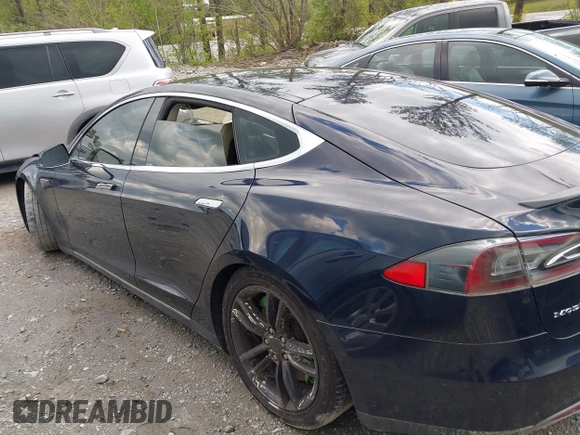 2014 Tesla Model S 60 with VIN 5YJSA1H15EFP43884, listed as a IAAI auction lot 41993180 with 78,305 mi miles and . Bid and sale history available at DreamBid. Image 13.