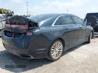 2013 Lincoln MKZ z VIN 3LN6L2G95DR822487, wystawiony jako IAAI lot #42347635 z przebiegiem 81 596 mil mil oraz . Historia ofert i sprzedaży dostępna na DreamBid. Obrazek 4.