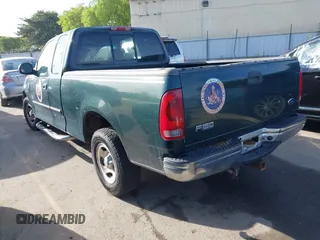 2002 Ford F-150 XL with VIN 1FTRX17L42NA52360, listed as a IAAI auction lot 41886697 with 121,346 mi miles. Bid and sale history available at carsss.com. Image 3.