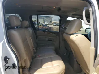 2011 Nissan Armada Platinum z VIN 5N1AA0NC7BN613402, wystawiony jako Copart lot #53395735 z przebiegiem 203 583 mil mil oraz Szkoda całkowita • Salvage title. Historia ofert i sprzedaży dostępna na DreamBid. Obrazek 11.