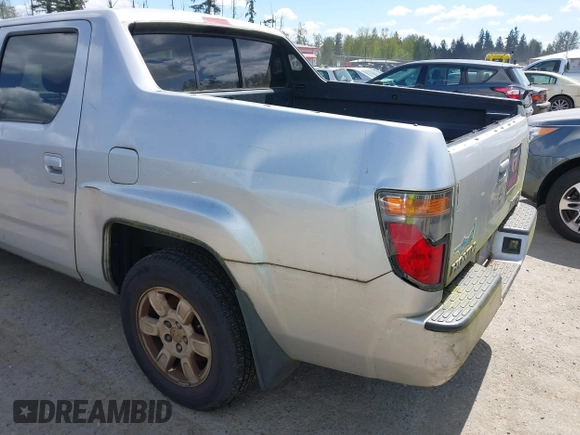 2006 Honda Ridgeline RTL with VIN 2HJYK16516H549986, listed as a IAAI auction lot 42084810 with 298,170 mi miles. Bid and sale history available at carsss.com. Image 6.
