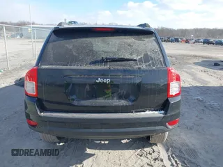2013 Jeep Compass Sport with VIN 1C4NJCBB2DD250650, listed as a IAAI auction lot 41068228 with 148,549 mi miles. Bid and sale history available at carsss.com. Image 16.