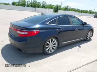 2013 Hyundai Azera with VIN KMHFH4JG8DA199154, listed as a IAAI auction lot 42214060 with 202,461 mi miles and . Bid and sale history available at carsss.com. Image 4.