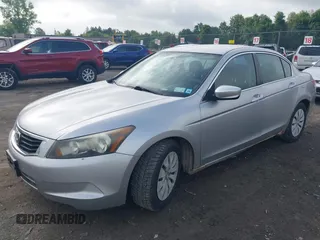 2010 Honda Accord LX with VIN 1HGCP2F38AA057033, listed as a IAAI auction lot 42679665 with 159,431 mi miles and . Bid and sale history available at DreamBid. Image 2.