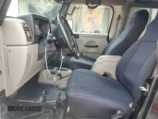2004 Jeep Wrangler Sahara with VIN 1J4FA59SX4P722608, listed as a Copart auction lot 51223345 with 146,600 mi miles and Salvage title. Bid and sale history available at DreamBid. Image 7.
