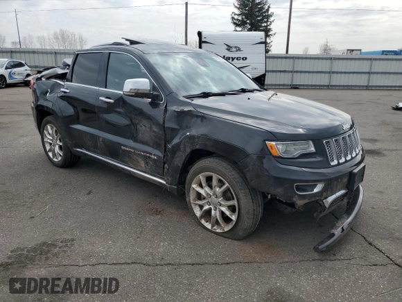 2015 Jeep Grand Cherokee Summit with VIN 1C4RJFJG2FC913658, listed as a Copart auction lot 52160035 with 138,008 mi miles and Salvage Title. Bid and sale history available at DreamBid. Image 4.