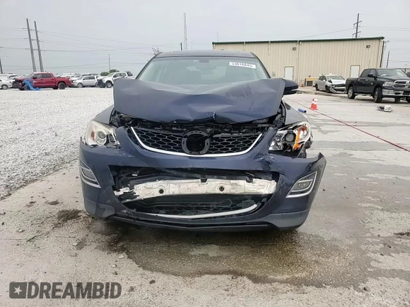 2012 Mazda CX-9 Grand Touring z VIN JM3TB2DA4C0359028, wystawiony jako Copart lot #53816845 z przebiegiem 148 848 mil mil oraz Szkoda całkowita • Salvage title. Historia ofert i sprzedaży dostępna na DreamBid. Obrazek 14.