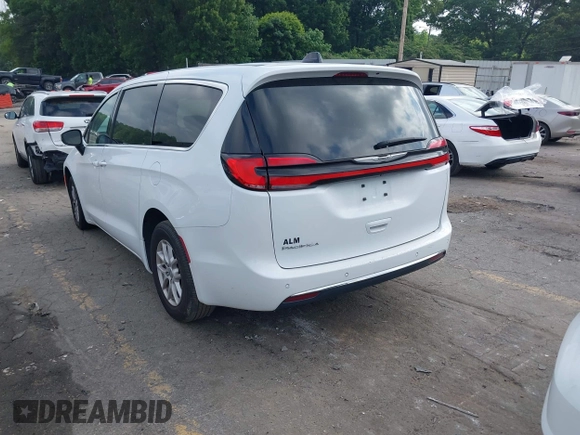 2023 Chrysler Pacifica Touring L with VIN 2C4RC1BG8PR535446, listed as a IAAI auction lot 42307923 with 65,718 mi miles and . Bid and sale history available at DreamBid. Image 3.