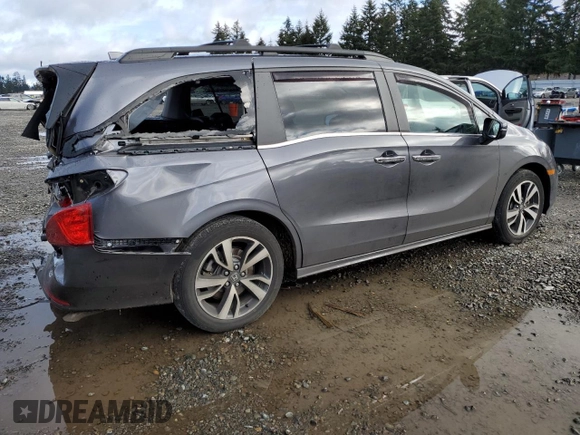 2021 Honda Odyssey Touring with VIN 5FNRL6H87MB033970, listed as a Copart auction lot 48928895 with 52,287 mi miles and Salvage Title. Bid and sale history available at carsss.com. Image 3.