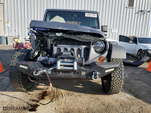 2009 Jeep Wrangler Unlimited X with VIN 1J4GA39159L707870, listed as a Copart auction lot 48561765 with 185,578 mi miles and Non Repairable. Bid and sale history available at carsss.com. Image 5.
