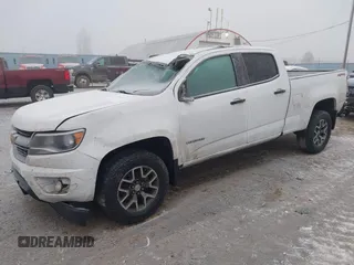 2018 Chevrolet Colorado 4WD Work Truck z VIN 1GCGTBEN3J1271023, wystawiony jako IAAI lot #41013812 z przebiegiem 124 032 mil mil oraz . Historia ofert i sprzedaży dostępna na DreamBid. Obrazek 2.